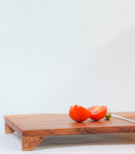 Walnut wood chopping board with legs and slot for knife